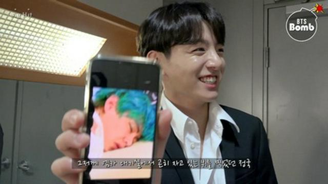 JK taking a photo of members sleeping