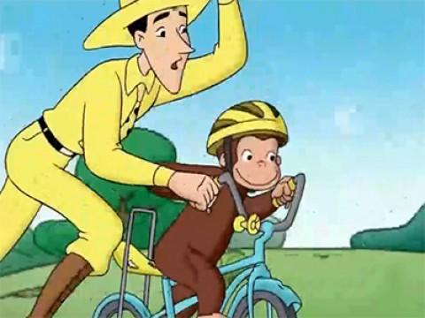 Curious George Rides a Bike