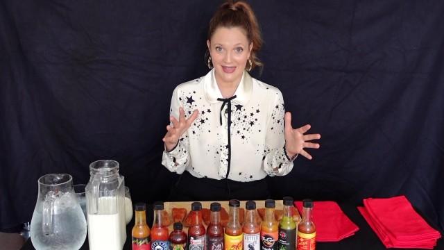 Drew Barrymore Has a Hard Time Processing While Eating Hot Wings